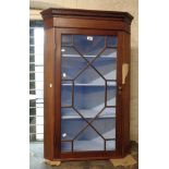 A 73cm 19th Century mahogany wall hanging corner cupboard with astragal glazed panel door and