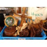 A selection of wooden items including carved elephant bookends, musical windmill, turned wood lidded