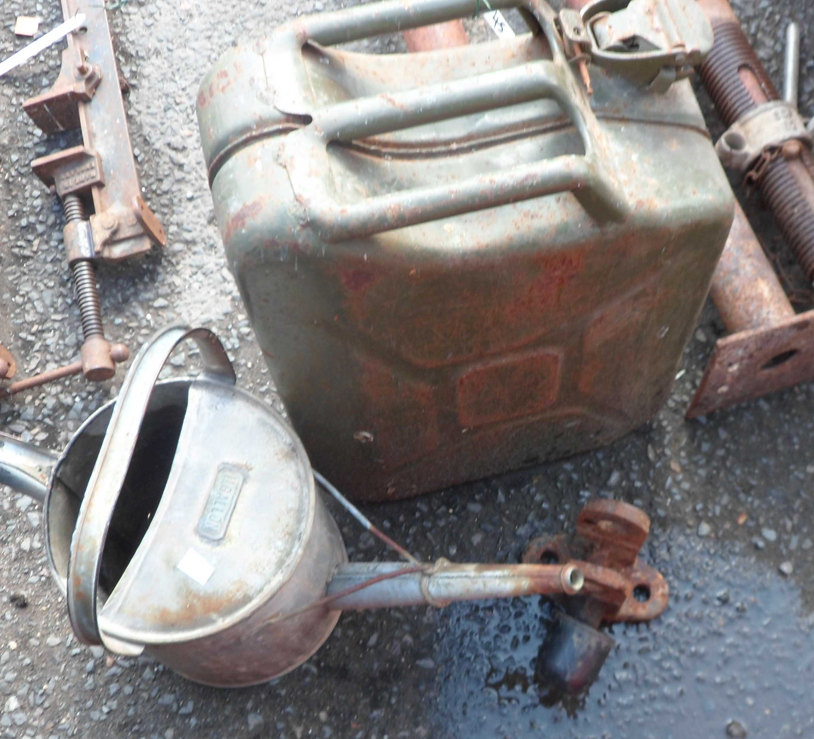 A watering can and a jerry can - sold with an old towbar