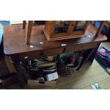 A 1.09m Victorian mahogany side table with two frieze drawers, set on turned legs - one handle