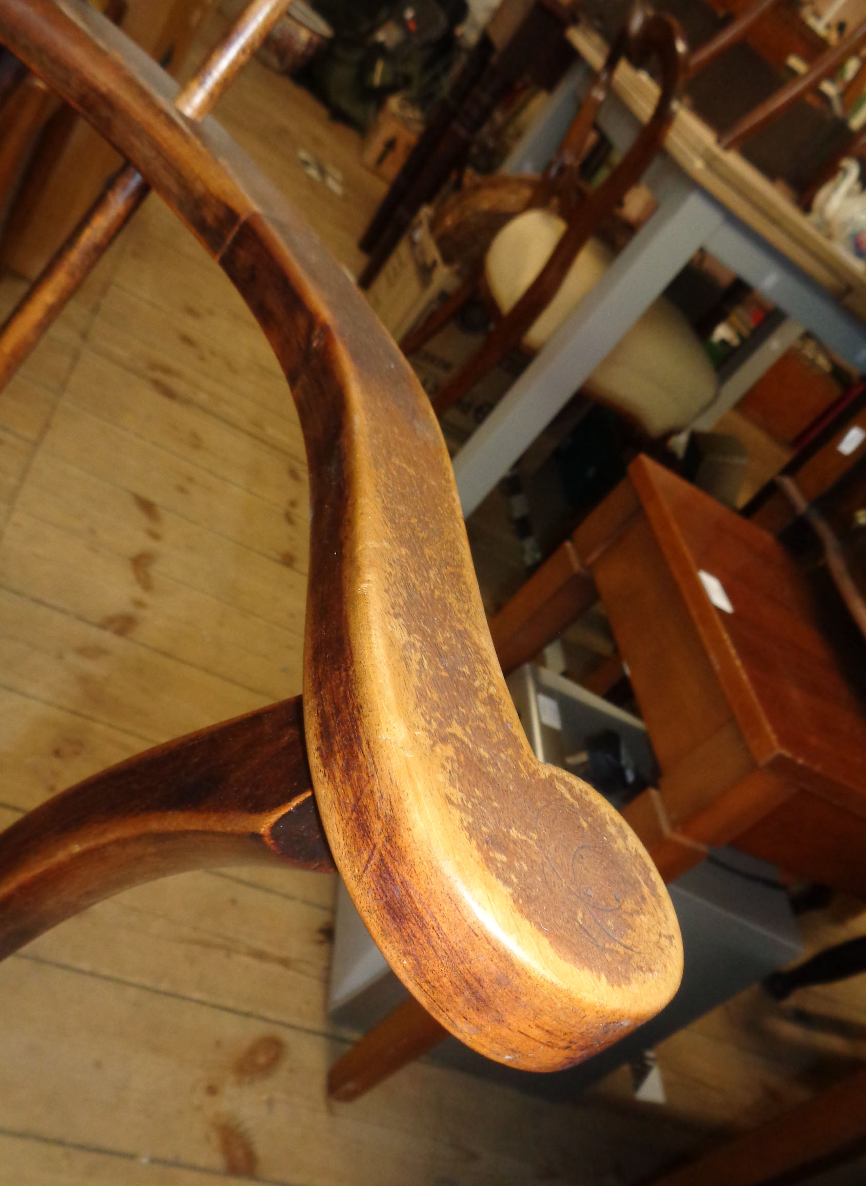 A 19th Century comb back Windsor elbow chair with solid moulded seat, set on turned supports - Image 4 of 8