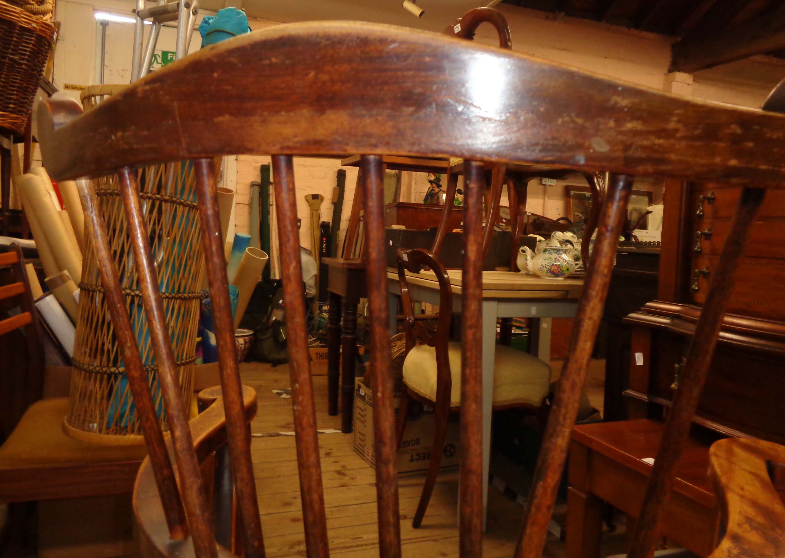 A 19th Century comb back Windsor elbow chair with solid moulded seat, set on turned supports - Image 6 of 8