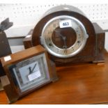 A vintage polished oak cased mantel clock with eight day chiming movement - sold with a small oak