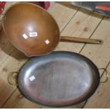 An old copper bowl form saucepan with brass handle - sold with a two handled shallow copper pan