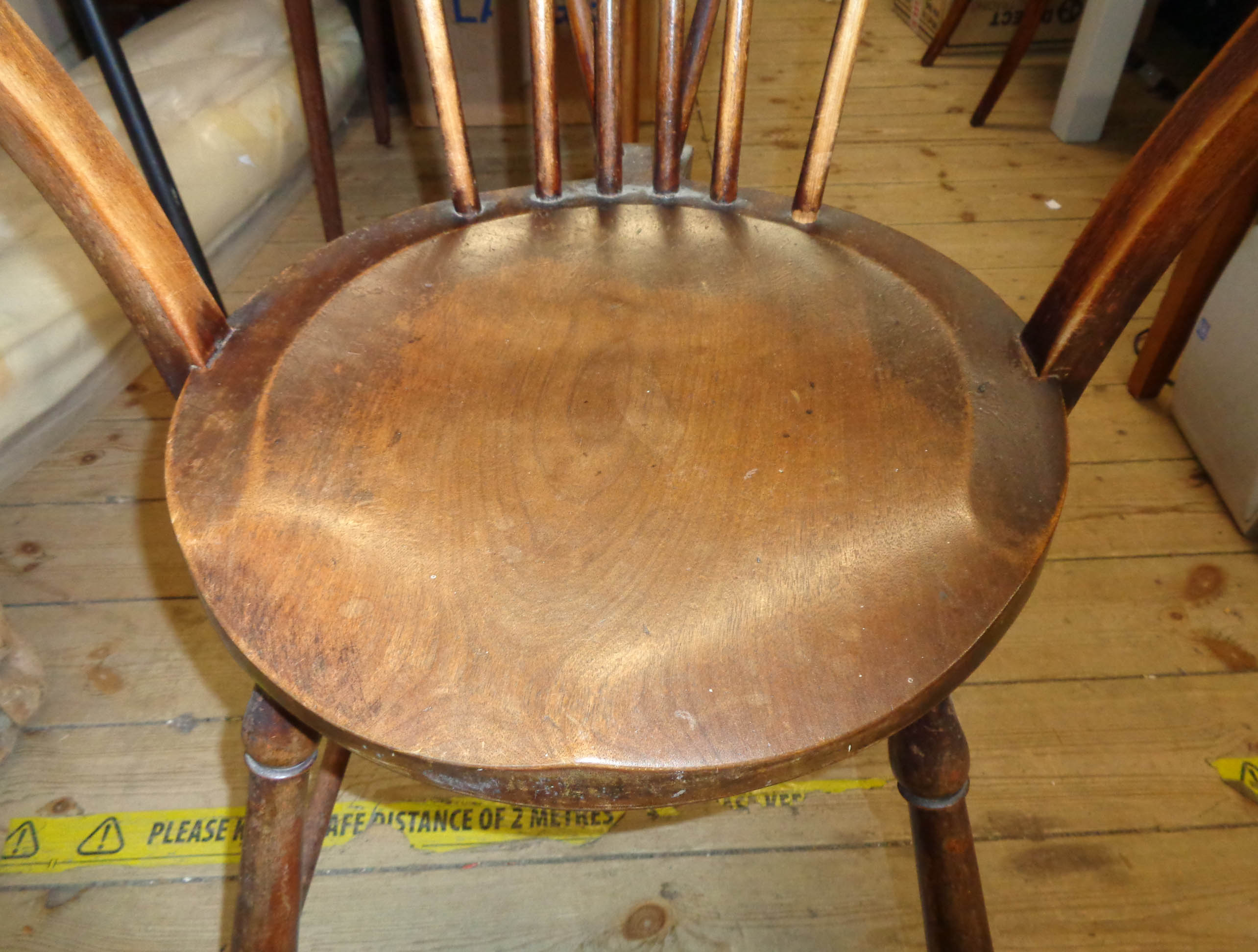A 19th Century comb back Windsor elbow chair with solid moulded seat, set on turned supports - Image 2 of 8