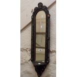 A Victorian ebonised and parcel gilt framed niche mirror with bracketed shelf under