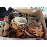 A box containing a quantity of assorted collectable items including cups and saucers, painted