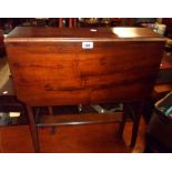 A 60cm walnut Sutherland table with canted corners to top and slatted ends