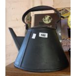 An old sheet tin kettle