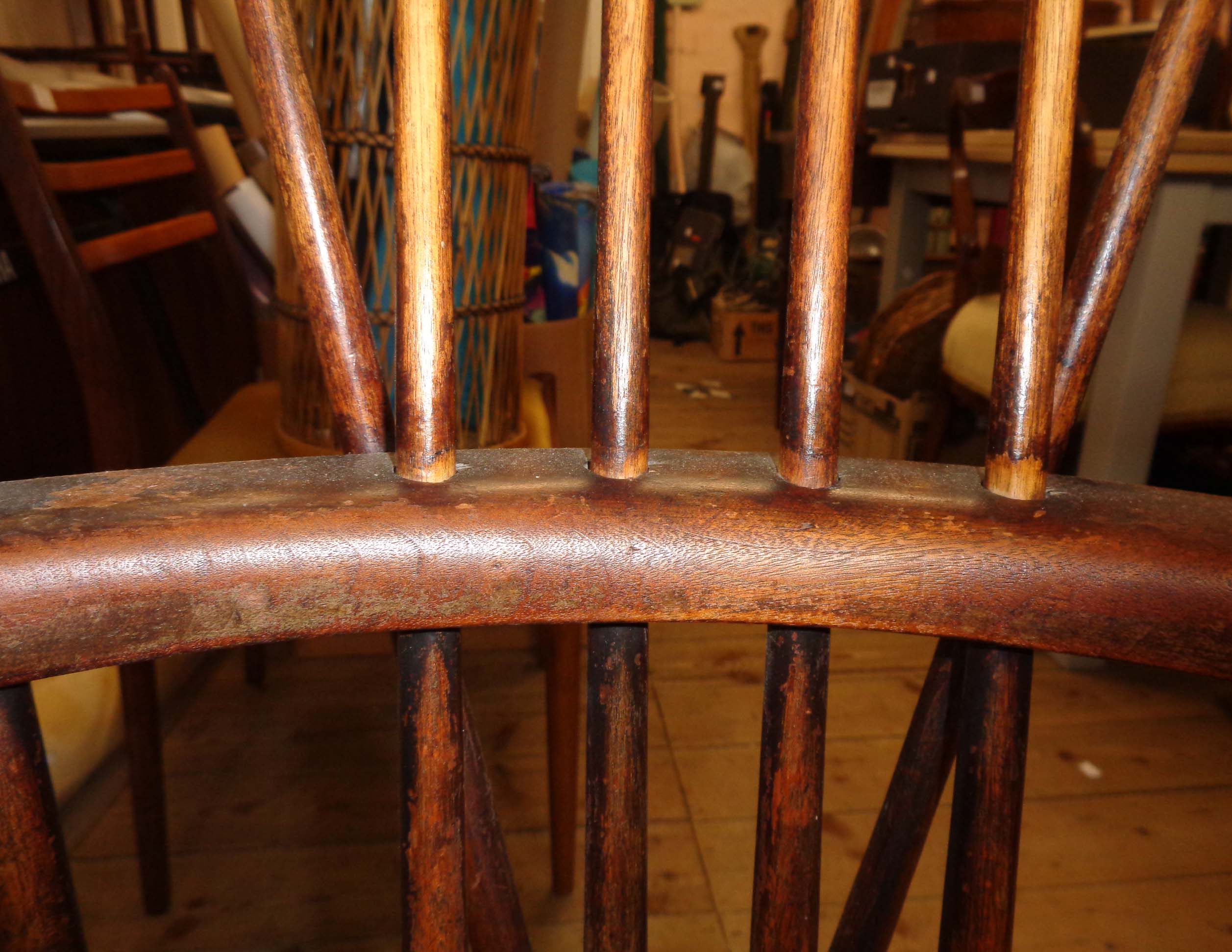 A 19th Century comb back Windsor elbow chair with solid moulded seat, set on turned supports - Image 5 of 8