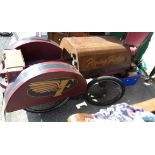 A downhill racing soap box style go-kart in the form of a vintage motorcar "Flying Fickle" with