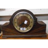A vintage oak cased mantel clock with eight day gong striking movement - sold with a modern quartz
