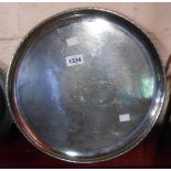 A vintage Keswick School of Industrial Art beaten Firth stainless steel tray with gadrooned rim