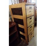 A 49cm vintage oak four drawer filing cabinet with varnished inset side panel and original drawer