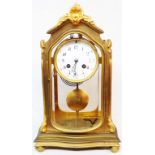 A late 19th Century French ormolu four glass table clock with Arabic numerals and Japy Freres
