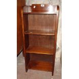 A small mahogany four shelf open bookcase