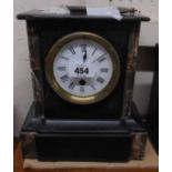 A late Victorian black slate and marble cased mantel timepiece with eight day movement