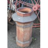 An old salt glaze stoneware chimney pot of octagonal form