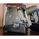 A vintage Aldis slide projector - sold with a Kopil III A8 Electric Eye Zoom-ee cine camera