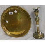 A brass advertising tray marked for Dewar's Perth Whisky - sold with an old brass candlestick with