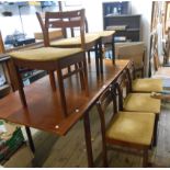 A set of six retro teak framed dining chairs by White & Newton with fabric upholstered seats, set on