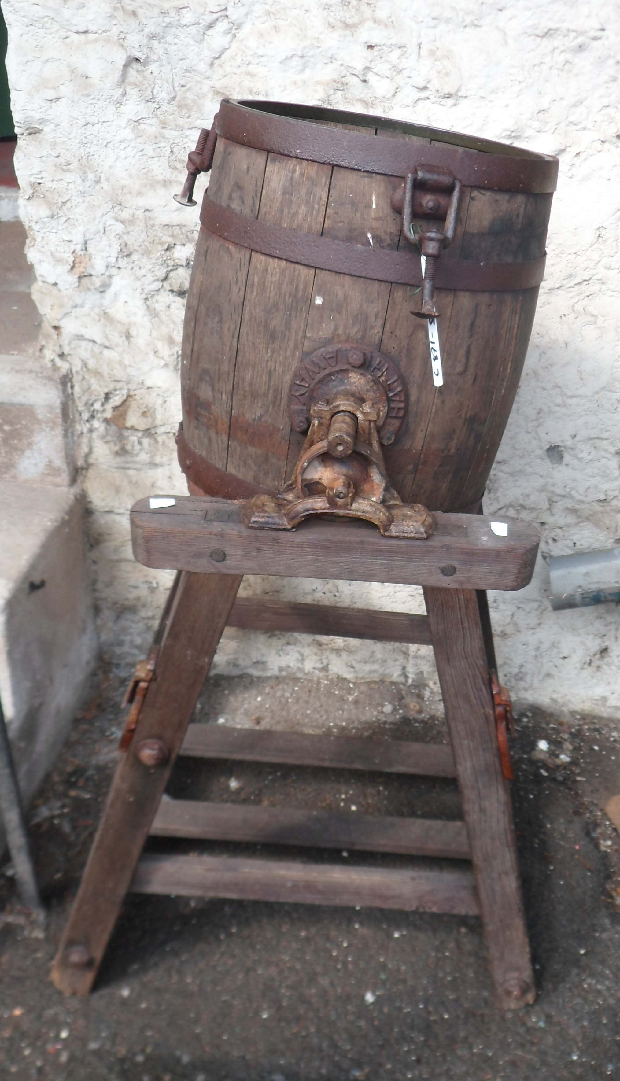 An old coopered butter churn with mounts marked for Hathaway of Chippenham - no lid