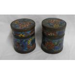A pair of Chinese cloisonne lidded pots of small cylindrical form