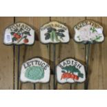 A set of modern painted cast iron vegetable labels