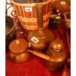 An old Indian brass tea caddy with embossed panel decoration depicting figures, an Eastern brass