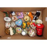 A box containing a collection of enamel and ceramic trinket boxes including Staffordshire Enamels,