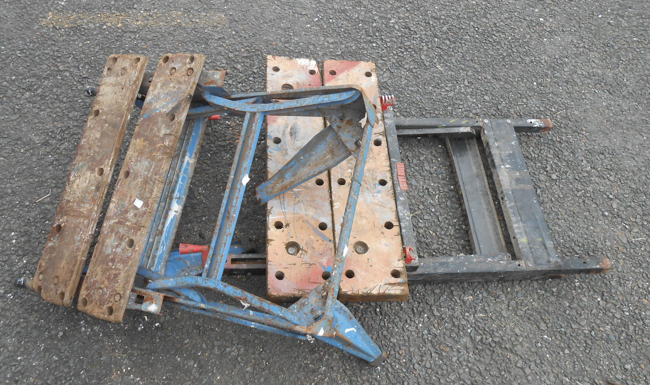 Two vintage folding workbenches