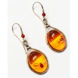 A pair of white metal mounted amber cabochon drop ear-rings