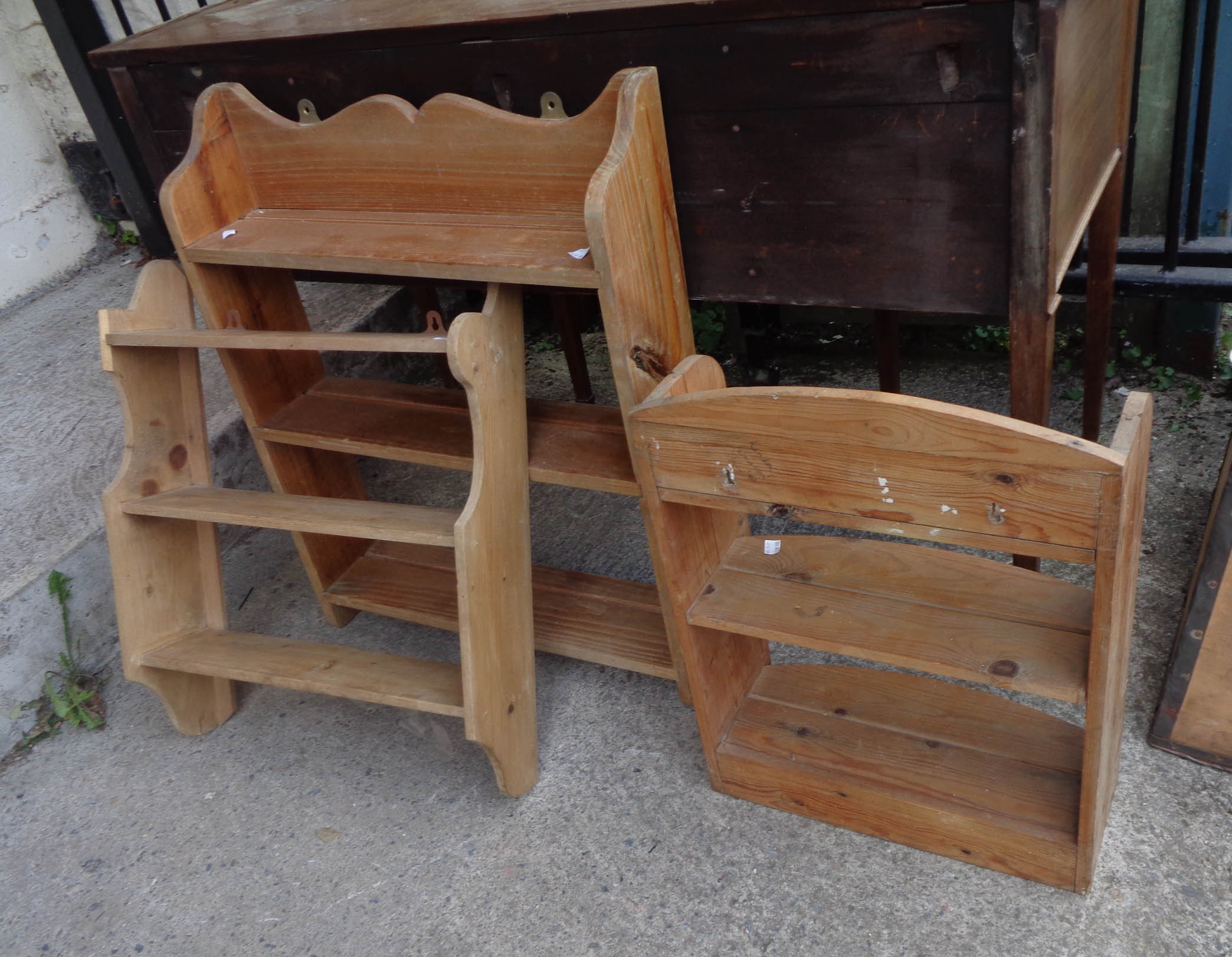 Three small pine wall shelves