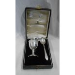 A cased silver egg cup and bright cut style spoon - Birmingham, 1936