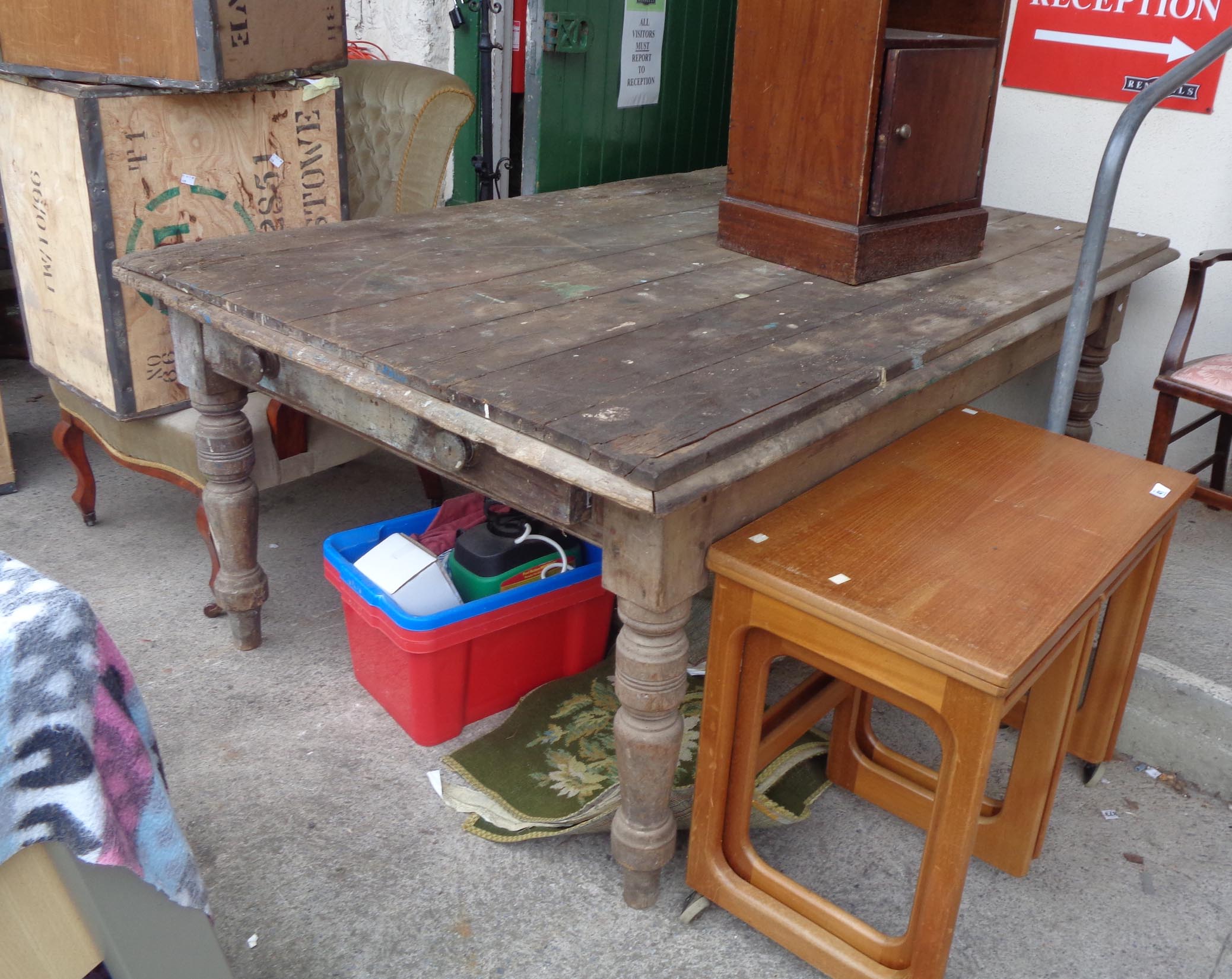 A large pine farmhouse table set on turned legs with large single drawer - for restoration
