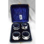 A cased set of four English silver napkin rings of faceted design - Birmingham 1927 in Colombo