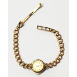 A vintage 9ct. gold Rotary lady's wristwatch with pierced link bracelet and 21 jewel incabloc