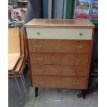 A 77cm retro sapele and mixed wood chest with flight of five drawers, set on moulded square