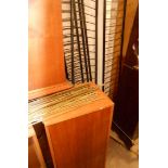 A quantity of retro Staples Ladderax teak effect modular shelving including metal uprights, bookcase