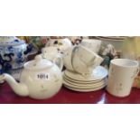 A small selection of Dartmouth pottery teaware comprising teapot, two large and three smaller cups