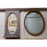 A small limed oak framed hall mirror with shelf under - sold with a Barbola style oval wall mirror