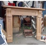 A large pine fire surround