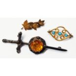 A Scottish silver claymore pattern brooch, set with large circular citrine - Glasgow 1953 - sold