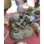 An antique hollow-cast brass depicting depicting cavorting putti - dent to base