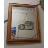 A modern pine framed oblong wall mirror