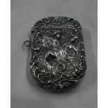 A marked 'Sterling' ornate vesta case with embossed Rococo scroll and female figure decoration