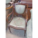 An Edwardian inlaid mahogany show frame shield back scroll elbow chair with studded upholstery -