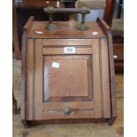 An old oak coal box with cast brass handle and original liner