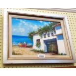 A framed modern oil on board, depicting a Mediterranean coastal building with beached rowing