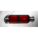 A white metal topped ruby glass double ended vinaigrette/scent bottle of faceted cut design